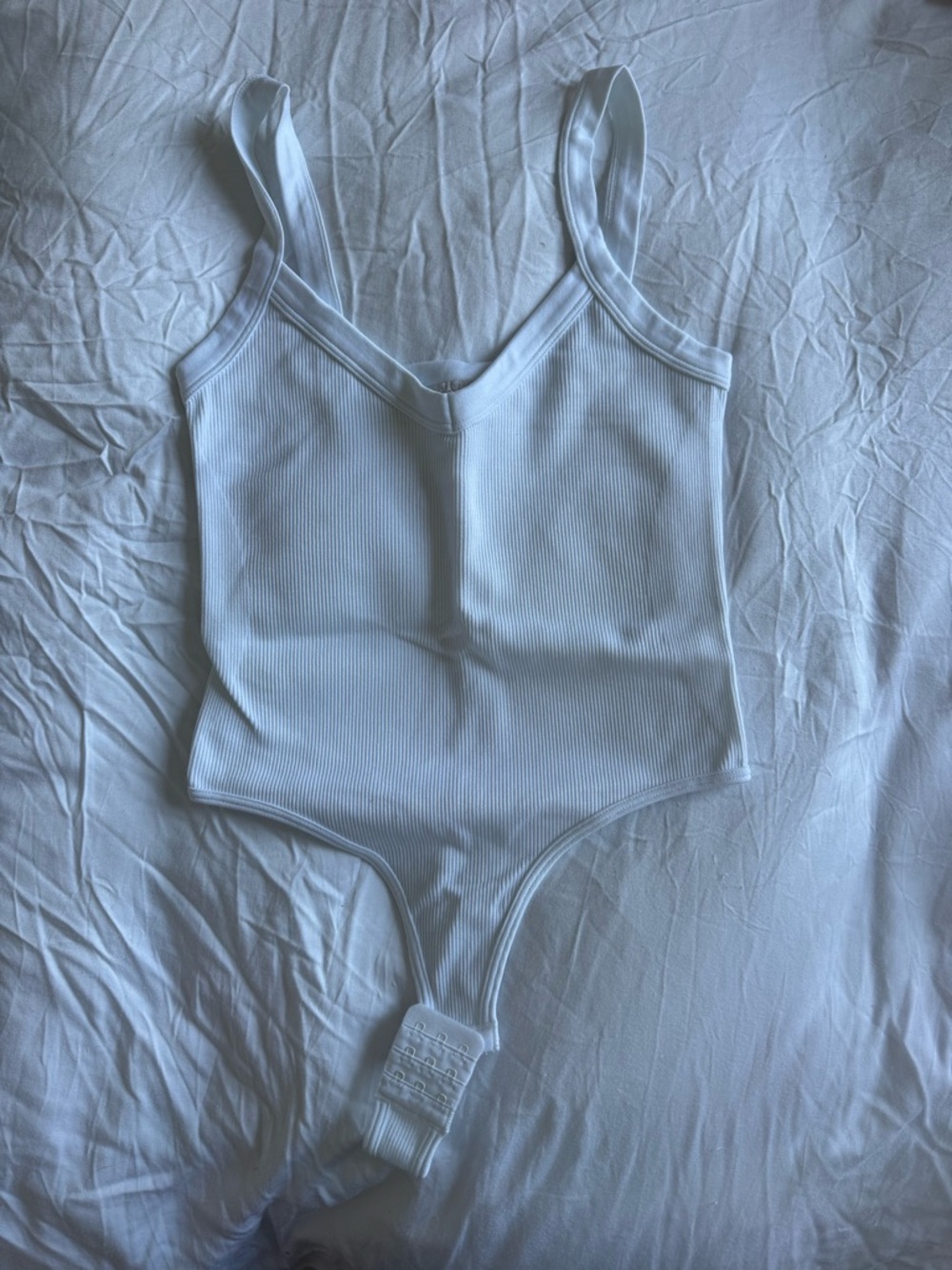 Ribbed V-Neck White Bodysuit with Snap Closure